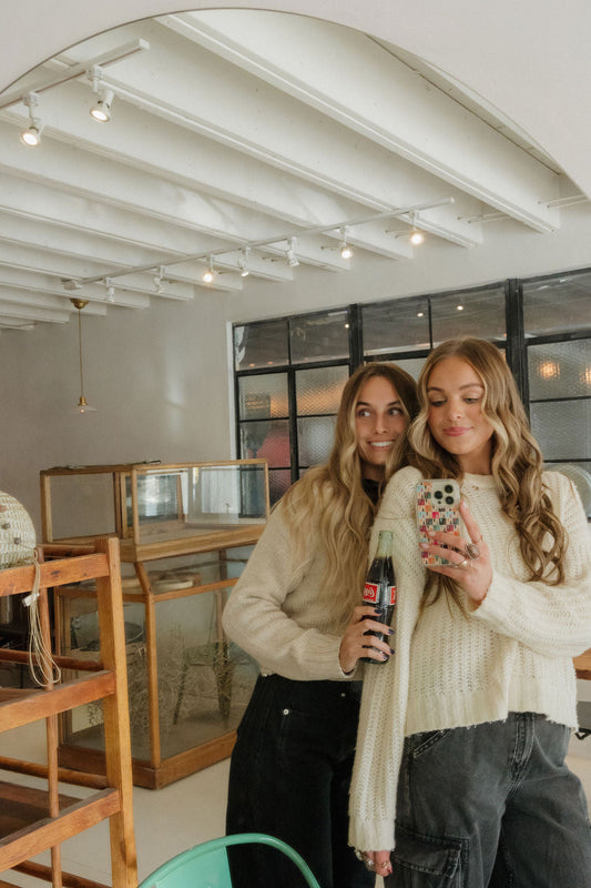girlies taking a selfie with a colorful phone case