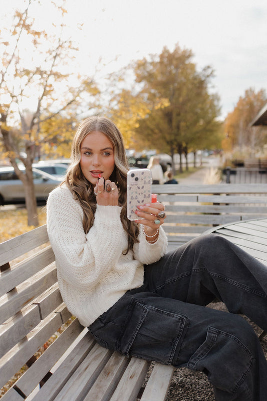 Dreamy and Delicate: The Blue Butterfly and Floral Phone Case Design