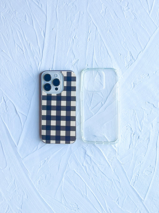 Black and cream gingham design on phone case insert with clear case